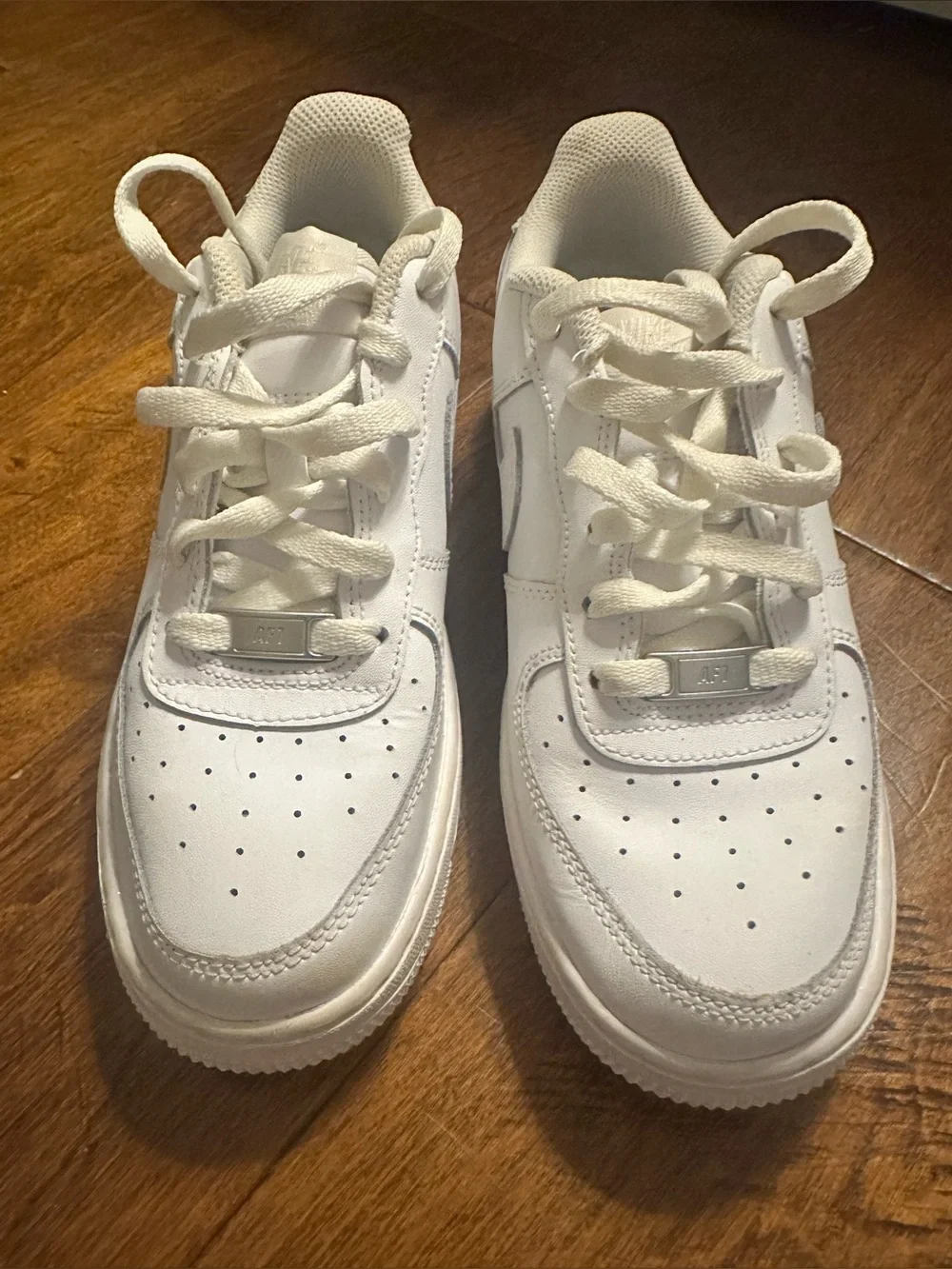 Nike Kids Air Force 1. White Low-Top Sneakers with Classic Swoosh